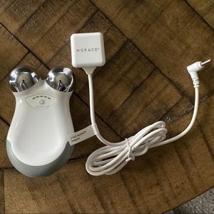 Nu Face micro-current facial lofting device